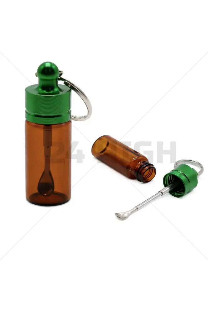 Glasflasche mit Löffel