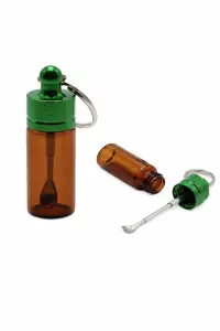 Glasflasche mit Löffel